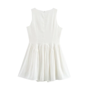 Close-up back view of white sleeveless dress showing invisible zipper and pleated waist detail