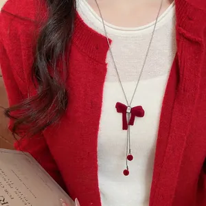 Elegant red velvet bow pendant necklace with zircon stone and plush ball charms for women