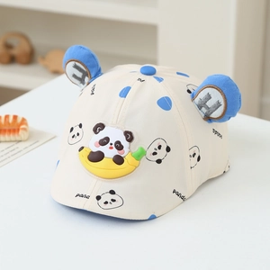 Close-up of kids beret hat with banana panda print and fuzzy blue ears for boys