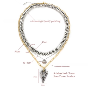 Detailed view of triple-layered necklace with 9mm Cuban chain and zircon lightning pendant