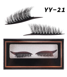 Detail of dramatic black false eyelashes with deep red glitter base in box YY-21