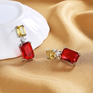 Elegant silver drop earrings featuring radiant red and yellow rectangular gemstones