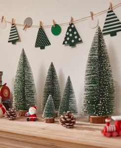 Miniature frosted Christmas trees with snow effect and wooden base for desk decoration