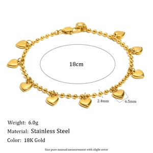 Polished 18K gold plated stainless steel beaded bracelet with heart pendant on white background