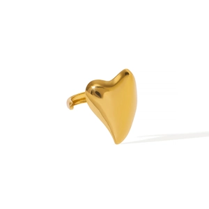 Polished gold heart-shaped ring with an asymmetrical minimalist design in stainless steel