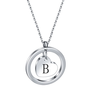 Minimalist stainless steel necklace featuring a round pendant with a laser-engraved letter B heart
