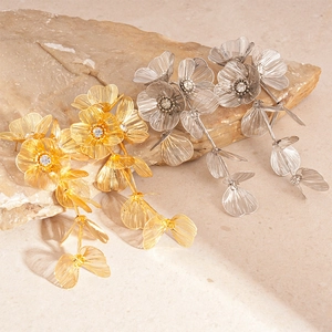 Elegant metallic flower tassel drop earrings with sparkling crystals on stone base