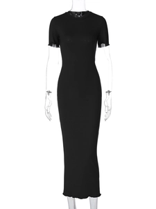 Detail view of black ribbed knit texture on a slim-fit round-neck maxi dress for women