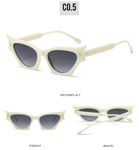 Three-view display of cream cat-eye sunglasses with gradient lenses and gold temple detail
