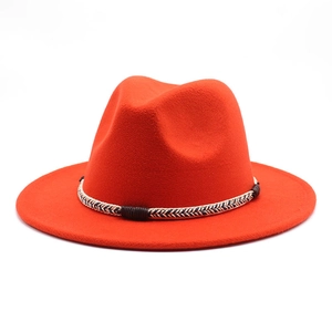 Orange wide-brim felt fedora hat with woven band for autumn winter fashion styles