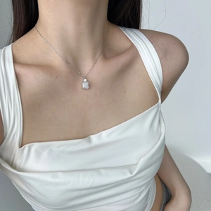 Elegant S925 silver necklace featuring a rectangular ice-cut crystal pendant on model