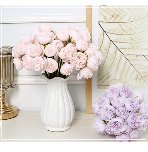 Detailed close-up of artificial peonies in pink and purple for elegant home decoration