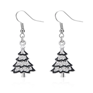 Detail of Christmas tree earrings with silver hooks and sparkling transparent crystals