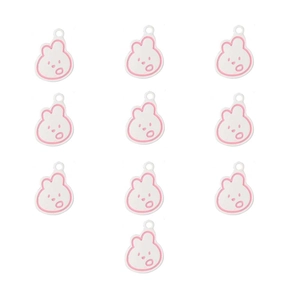 Close-up of 10 white rabbit-shaped DIY charms with pink outlines for hair accessories