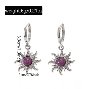 Detailed view of sun-shaped earrings with purple stone and zircon measurements