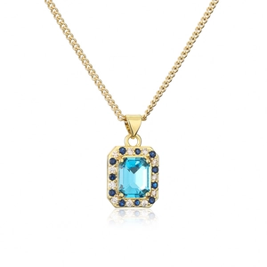Classic gold chain necklace with rectangular blue zircon pendant and halo stones