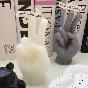 Creative V-sign hand gesture scented candle in white and grey for minimalist home decor