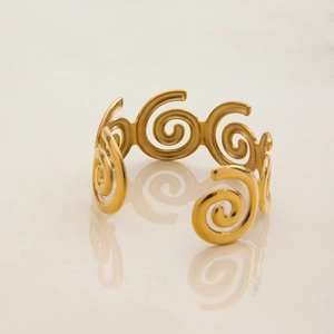Polished gold stainless steel open bangle with unique spiral wave-like ring pattern