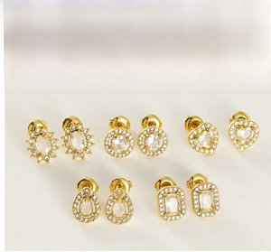 Detailed set of five gold plated stainless steel earrings with sparkling diamonds