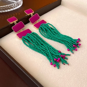 Magenta and emerald beaded fringe drop earrings with bohemian enamel accents