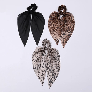 Three-piece leopard print chiffon scrunchies set in black and brown minimalist style