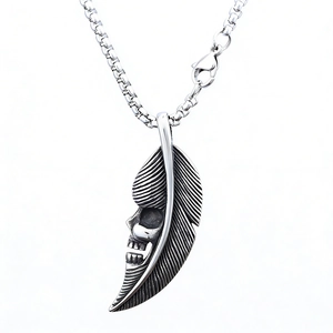 Vintage silver skull feather pendant necklace in punk gothic style for daily wear