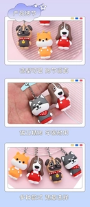 Detail of cute cartoon dog keychains in pug and husky styles with soft silicone texture