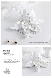 White maple leaf jewelry display stand with intricate leaf vein texture for earrings