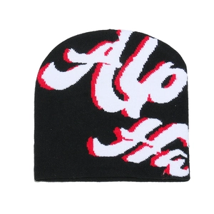 Black knitted beanie hat with red and white jacquard pattern for winter warmth