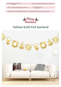 Detail of Christmas bunting with gold foil snowflakes and trees on a white wall