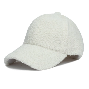 Close-up of white sherpa fleece texture and six-panel stitch on winter baseball cap