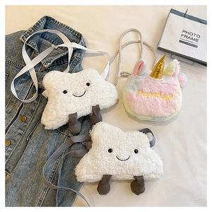 Close-up of cute cloud and rainbow unicorn plush crossbody bags with soft straps