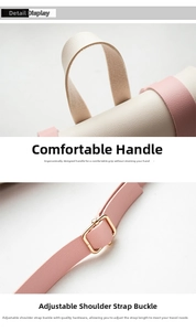 Detailed view of comfortable top handle and adjustable strap buckle on small square backpack