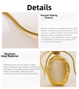 Detail view of the vacuum plated titanium steel necklace with an oval cat eye stone pendant