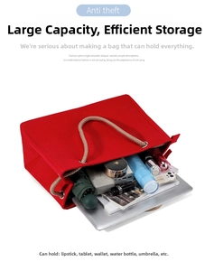 Top view of large red canvas tote showing interior capacity for laptop and daily essentials