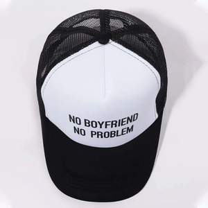 Top view of two-tone trucker hat with No Boyfriend No Problem print and mesh back