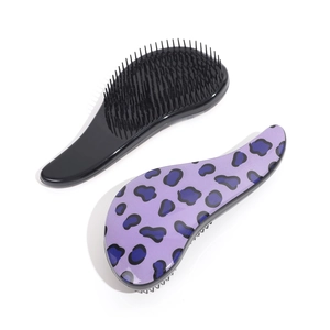 Portable leopard print and black detangling hairbrushes for wet and dry hair care