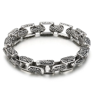 Retro silver titanium steel chain bracelet with intricate vintage floral patterns