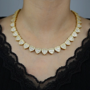 Luxury gold heart chain necklace with baguette cut zircon stones for a hip hop style