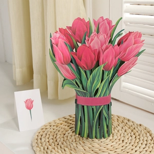 Detail shot of 3D pop-up greeting card featuring a red and pink tulip flower bouquet