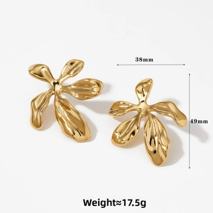 Detailed view of irregular golden flower earrings with 38mm width and 49mm height specs
