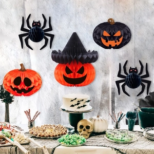 Halloween hanging honeycomb ornaments featuring pumpkin and spider designs for party decor