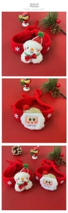 Detailed view of handmade knitted Christmas pet collars with Santa and Snowman motifs