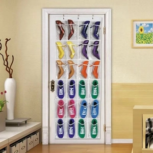 Over-the-door 24-pocket shoe organizer in white with clear PVC slots for easy visibility