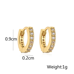 Detailed view of small gold hoop earrings measuring 0.9cm with micro-inlaid clear crystals