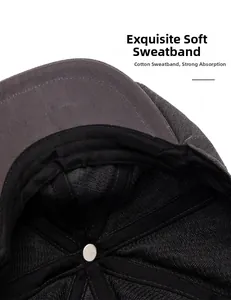 Detailed macro view of soft cotton sweatband inside a grey herringbone newsboy cap