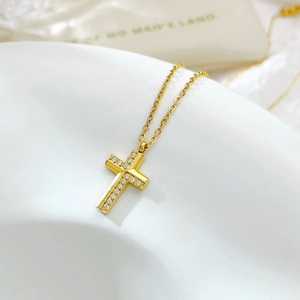 Elegant gold cross necklace with micro-paved cubic zirconia stones and link chain