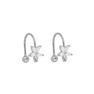 Detailed close-up of silver flower stud earrings with shimmering white zircon stones