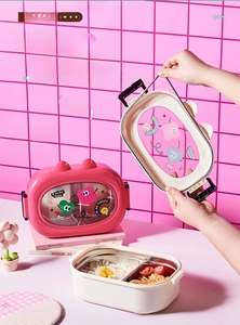 Detail of pink cartoon bento box featuring stainless steel lining and leak-proof seal