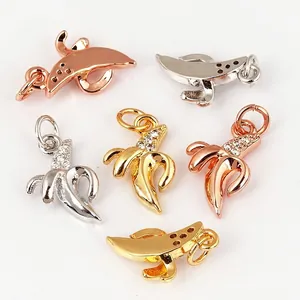 Three-color gold banana pendants in rose, white, and yellow gold with micro-inlaid zircons